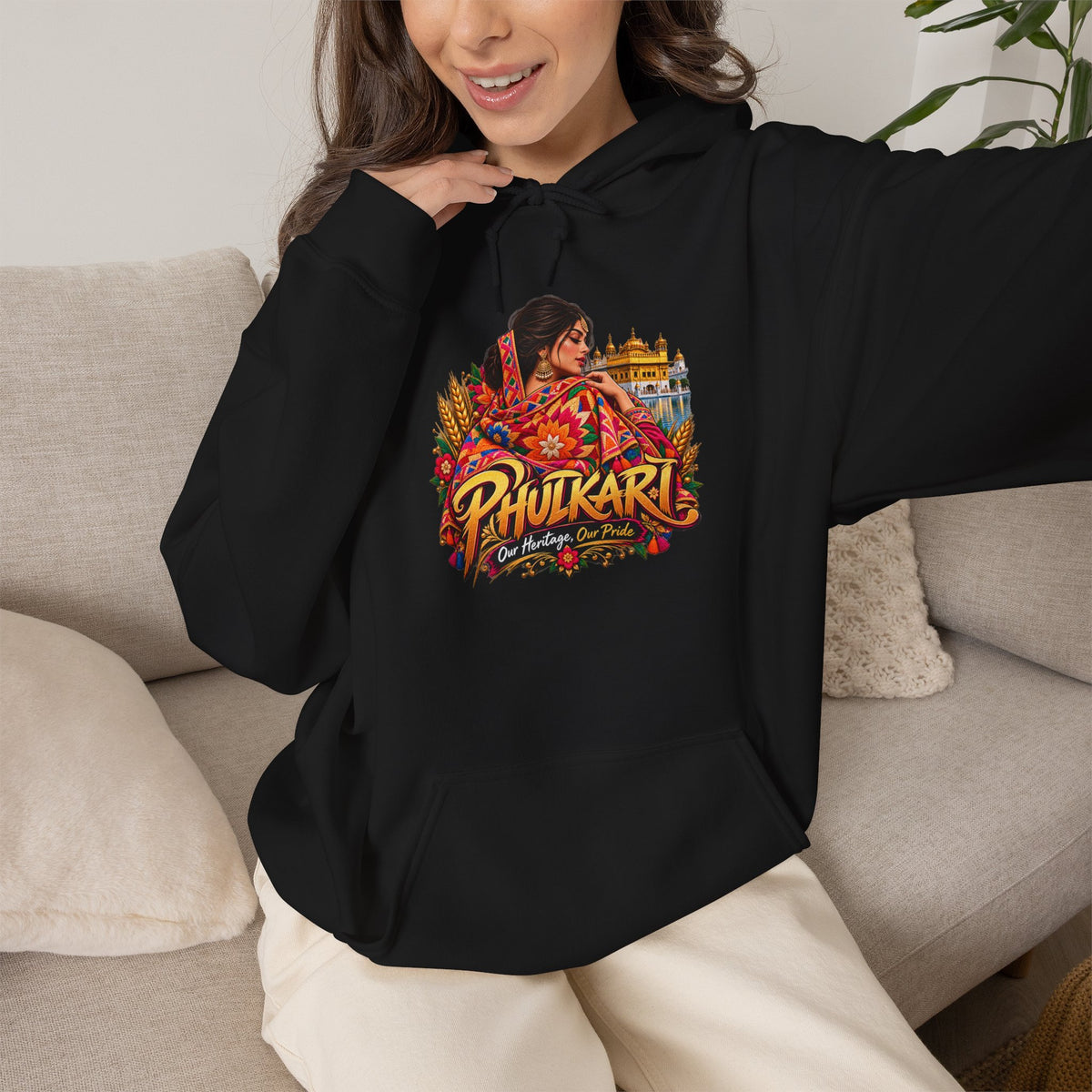 Phulkari-inspired floral graphic hoodie with hand-lettered typography.