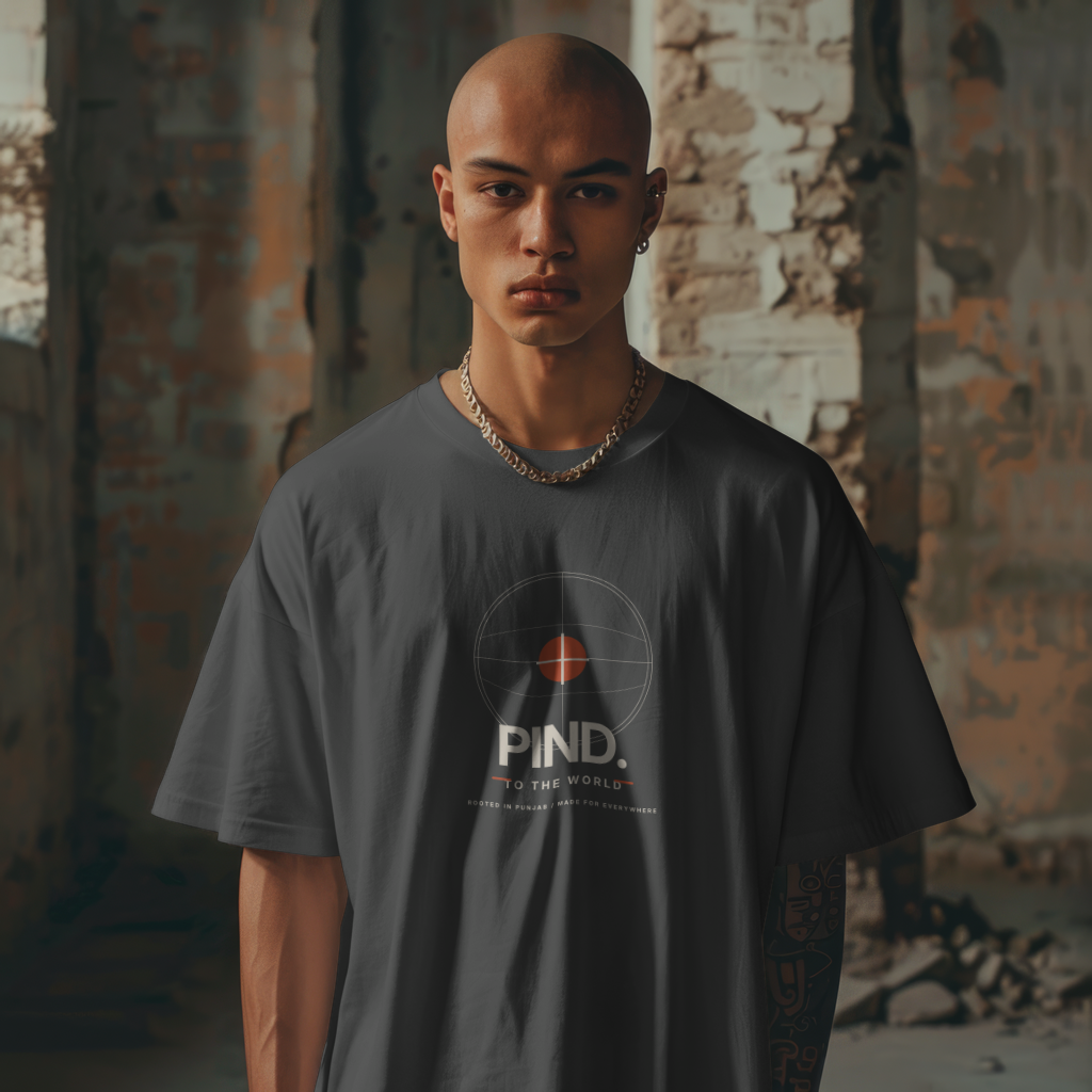 PIND. T-shirt — centered front print, person wearing it, studio background