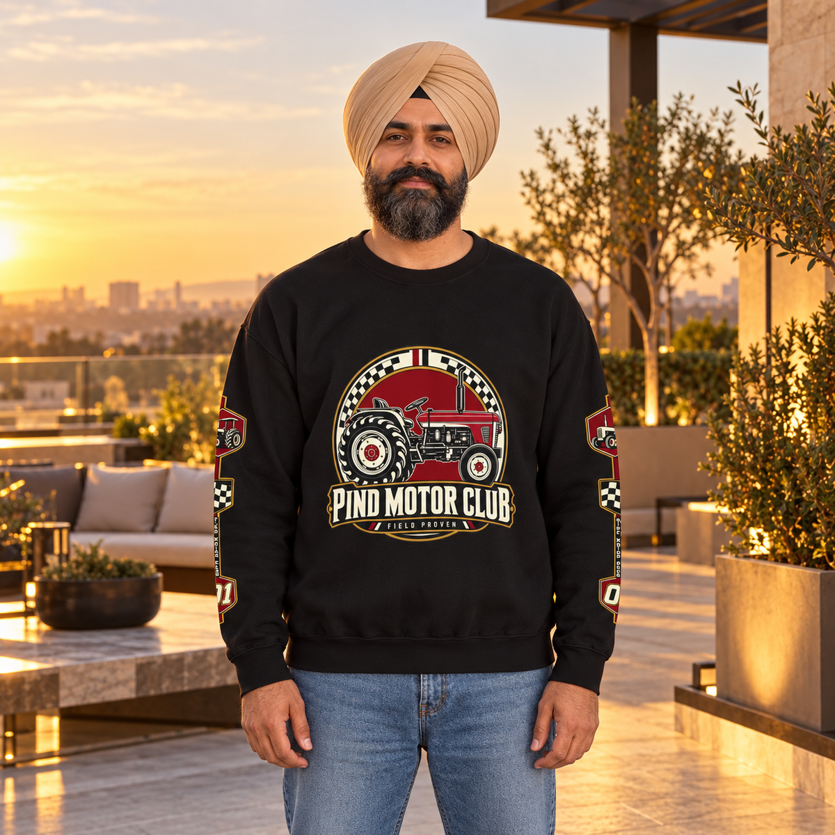 Pind Motor Club black tractor sweatshirt with front and sleeve prints, Sikh model on luxury rooftop terrace
