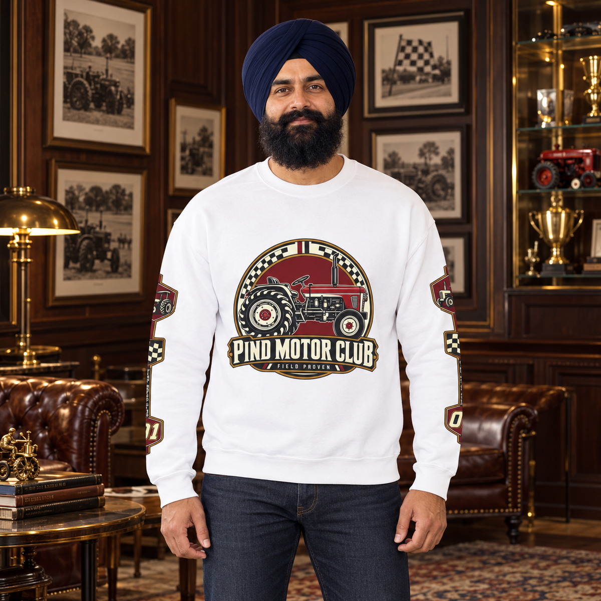 Pind Motor Club white sweatshirt, centered tractor and sleeve prints, Sikh model in collectors clubhouse