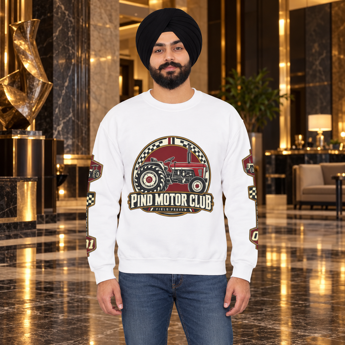 Pind Motor Club white sweatshirt, centered tractor and sleeve prints, Sikh model in luxury art hotel